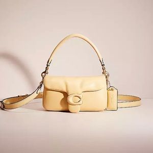 Coach Pillow Tabby 18 in Butter Yellow.